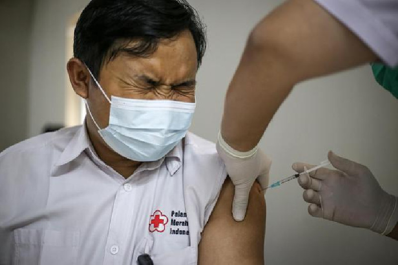 Perpres Jokowi, Tidak Vaksin Ancaman Tak Dapat Bansos