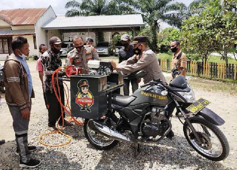 Polsek di Aceh Timur Ubah Sepeda Motor Dinas Menjadi Alat Pemadam