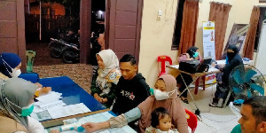 Polres hokseumawe buka Layanan Vaksin Malam Hari