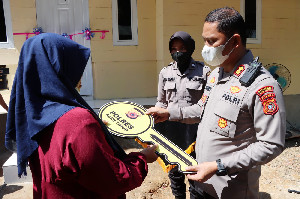 Polres Aceh Timur Gelar Baksos dan Serahkan Bantuan Rumah Dhuafa