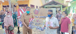 Pemkab Aceh Utara Bersama Muspika Sawang Salurkan Bantuan Tunai