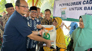 Pj Bupati Aceh Utara Salurkan 73,5 Ton Bantuan Pangan Cadangan Beras Pemerintah