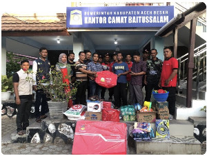 Pemkab Aceh Besar, Serahkan Bantuan Masa Panik untuk Korban Kebakaran Ruko di Baitussalam