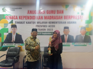 Siti Aminah Terpilih sebagai Pustakawan Berprestasi Provinsi Aceh di GTK 2023