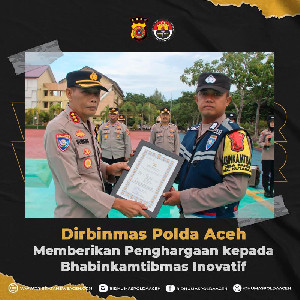 Berbagi Minuman Jahe Gratis, Bripka Ibnu Raih Penghargaan dari Polda Aceh