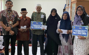 BMK Banda Aceh Berikan Insentif Petugas Tajhiz Mayat di 90 Gampong