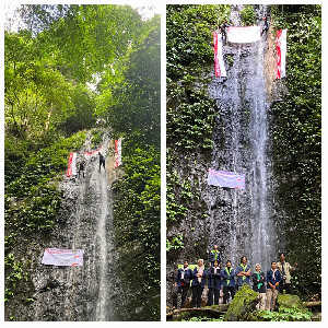 Gainpala UIN Ar-Raniry Kibarkan Bendera Merah Putih di Air Terjun Seulawah Agam