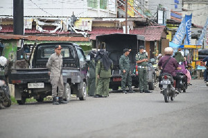 Pastikan Kepatuhan, Satpol PP WH Aceh Besar Tertibkan Pedagang Takjil Selama Ramadhan