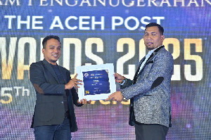 Ketua KIP Banda Aceh Terima Penghargaan Sebagai Lembaga Penjaga Integritas Pemilu Damai