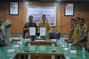 Sekda Aceh Bertemu Kepala ANRI, Bahas Penanganan Banjir dan Penyelamatan Arsip