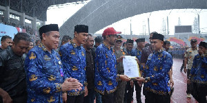 Di Bawah Hujan, SK Itu Akhirnya Datang