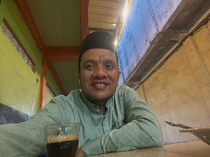 Lorong Peunayong dan Puisi Sunyi Reza Karmilin