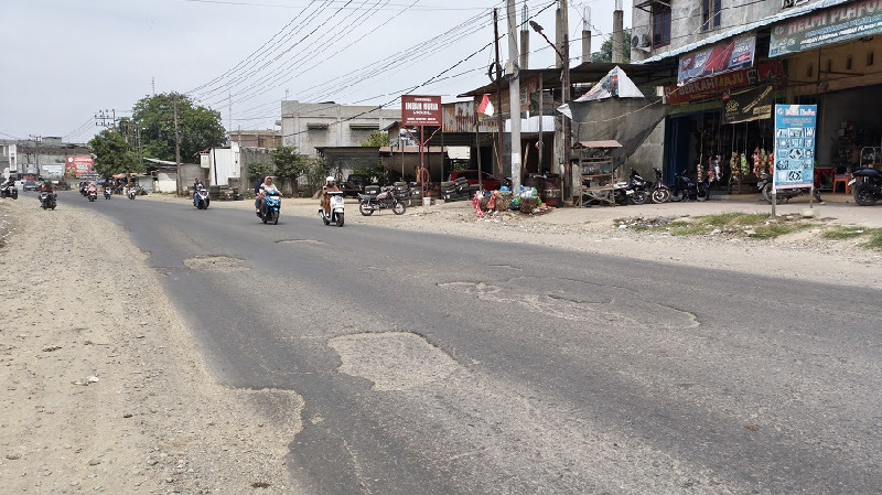 Jalan Nasional di Krueng Mane Aceh Utara Rusak Parah, Warga Desak BPJN Segera Bertindak